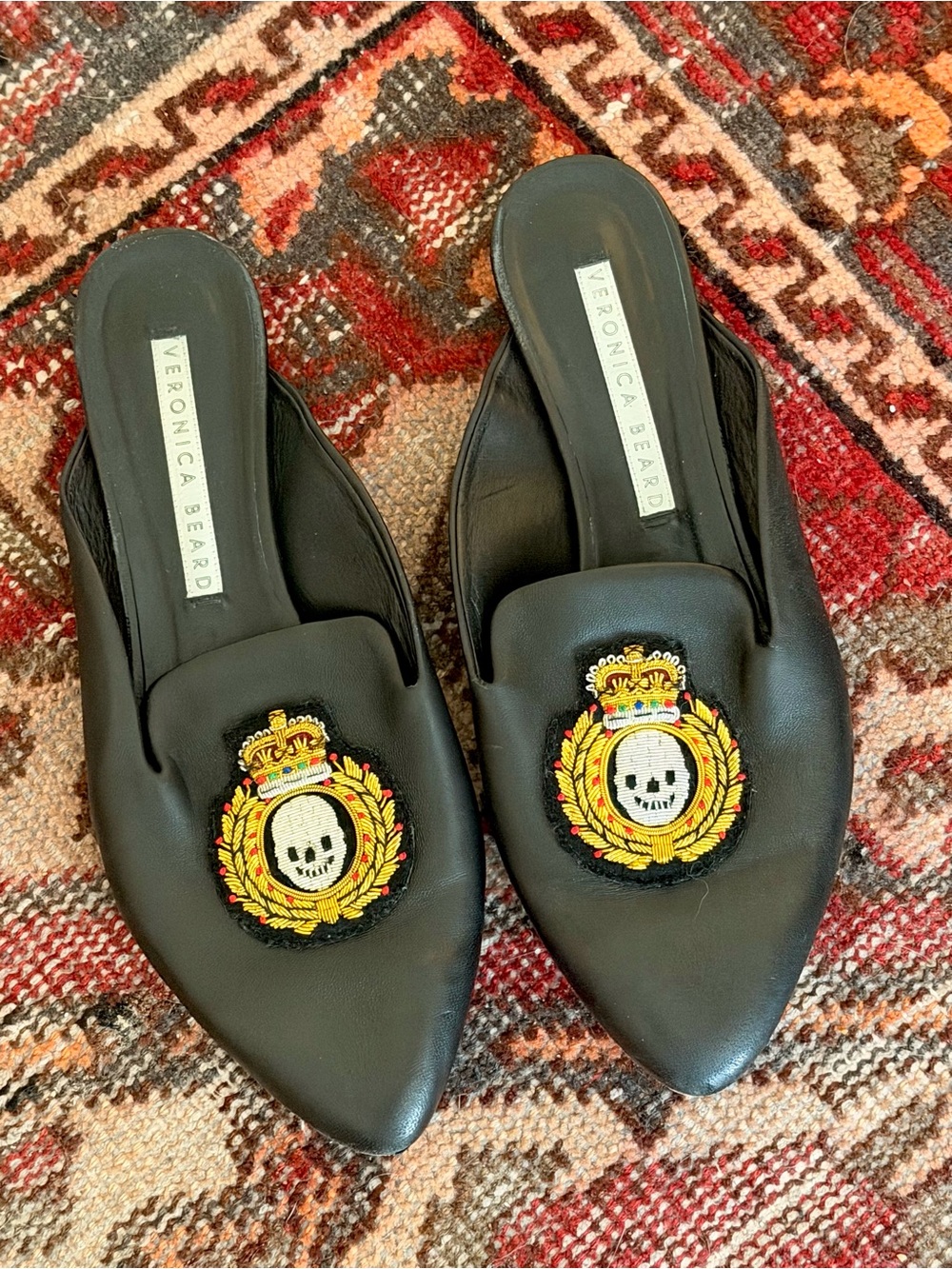 Veronica Beard Black Leather Mules with Embroidered Skull Crest Halloween